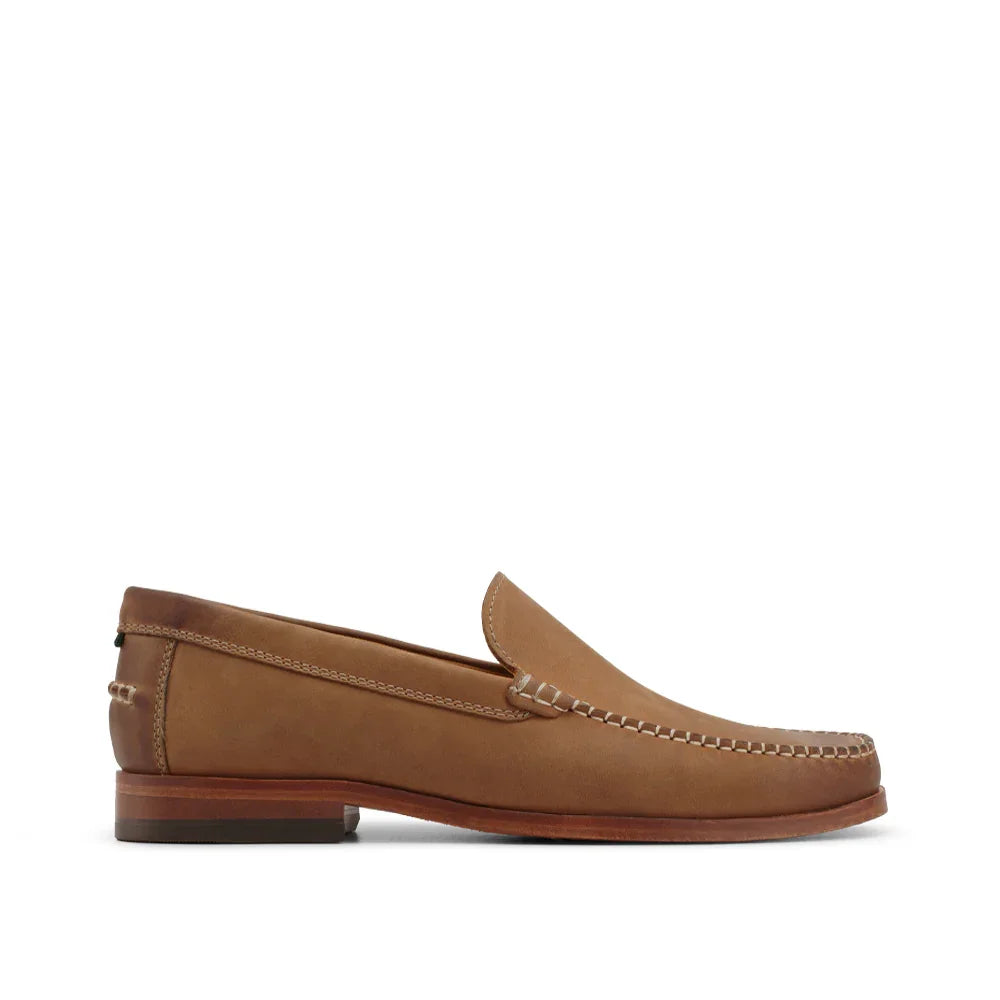 Men's clay brown leather loafer with stitched detail and low wooden heel, side view