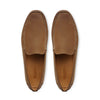 Top view of tan leather loafers with visible stitched detailing on white background