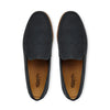 Pair of black leather loafers with tan interior, moc toe stitching, top view on white background