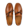 Top view of brown leather moc toe loafers with dark laces, classic men’s slip-on shoes