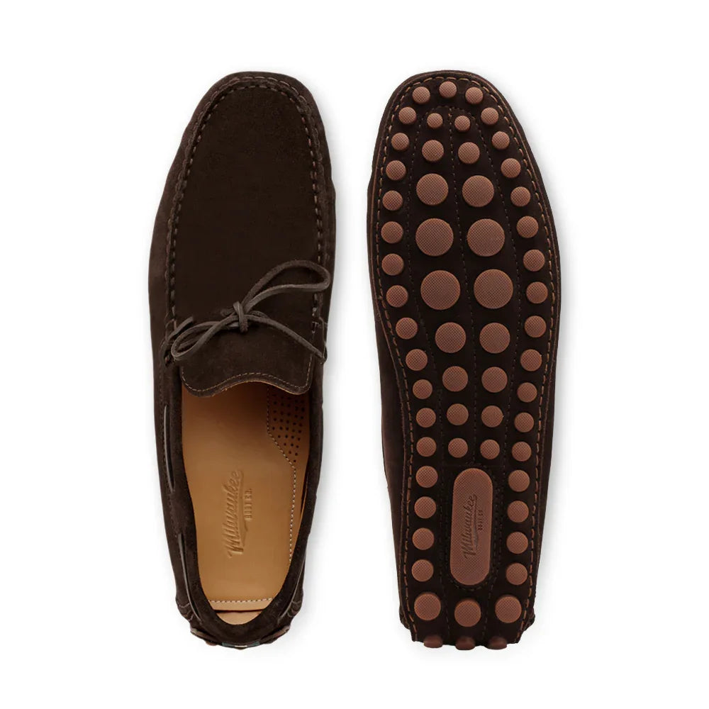 Dark brown suede loafers with moc toe, lace detail, and rubber dot sole, top and bottom view