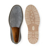 Gray suede slip-on shoe with tan sole, shown top and bottom view on white background