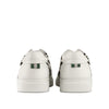 Back view of white leather sneakers with zebra print sides and green heel tab accents